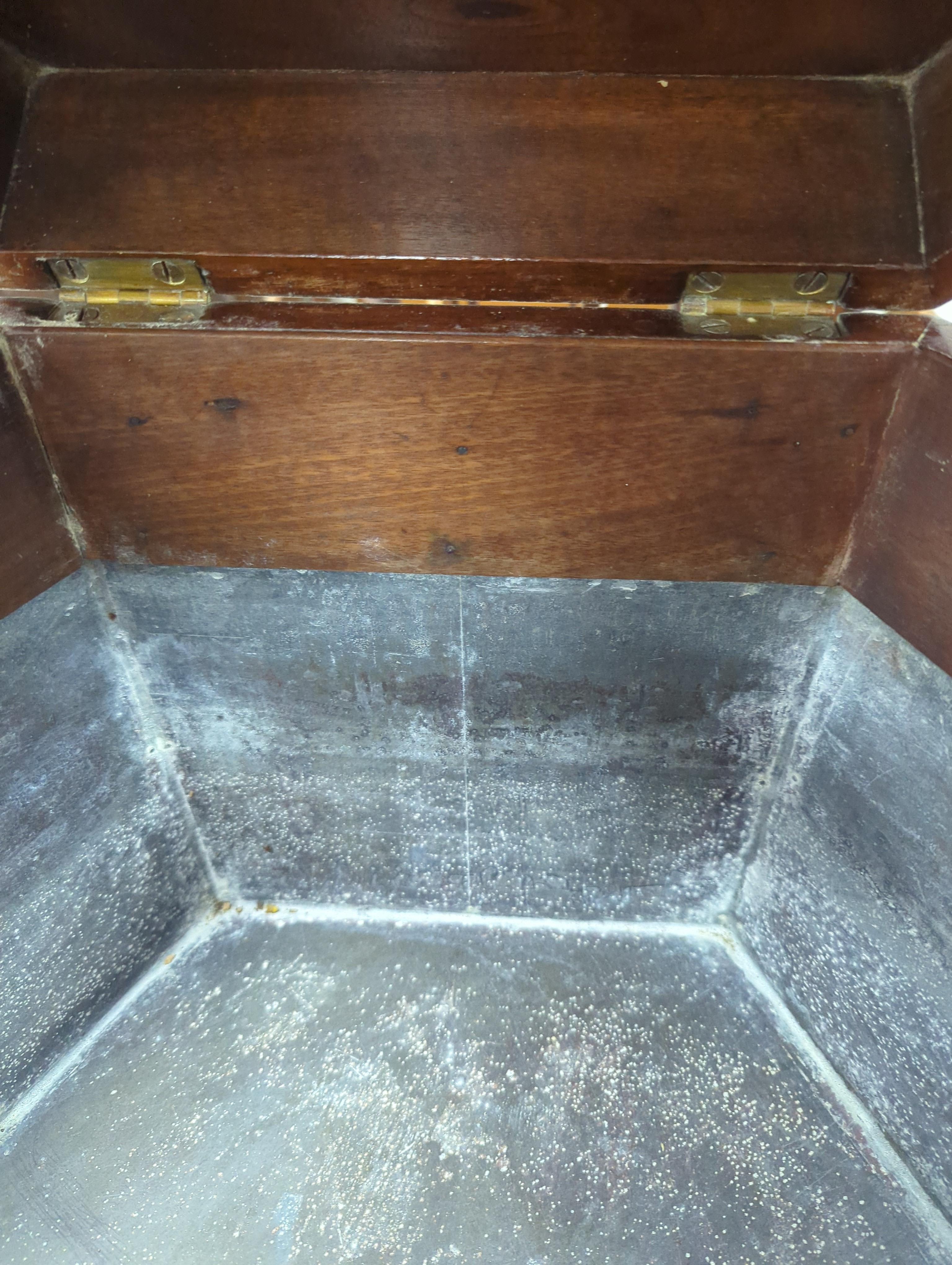 A George III hexagonal brass-bound wine cooler, width 48cm, height 66cm